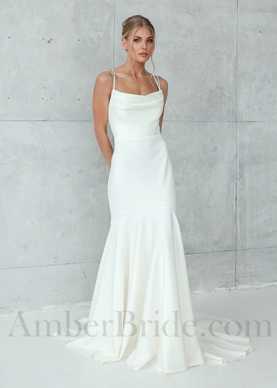 Elegant Open Back Mermaid Wedding Dress with Spaghetti Straps and Appliques