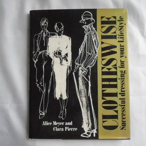 May include: A black and gold book titled "Clotheswise: Successful dressing for your lifestyle" by Alice Meyer and Clara Pierre. The cover features a black and white illustration of three people.