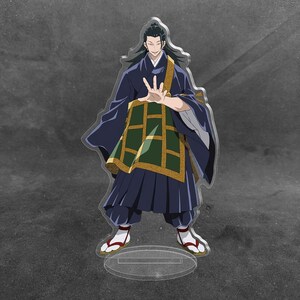 May include: An acrylic standee featuring an anime character with long black hair, wearing a dark blue robe with a green and gold patterned sash. The character has a hand extended forward and is wearing traditional sandals with white socks.