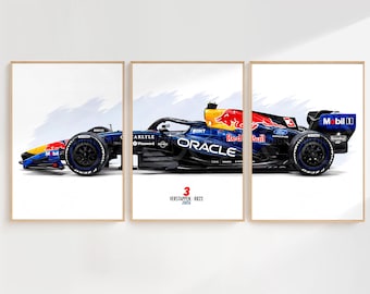 May include: Set of three framed prints featuring a Formula 1 race car in blue, red, and yellow. The car has sponsor logos and the number 3. The prints are displayed against a white background with a light blue wash.