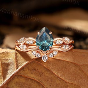 Teal Sapphire engagement ring set Rose gold bridal set Round curved moissanite diamond ring Claw prong set Unique Anniversary Promise ring