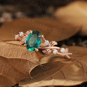 Oval cut Lab Emerald engagement ring rose gold|Art deco leaf design diamond Bridal ring|Unique twist prong set wedding ring Anniversary ring