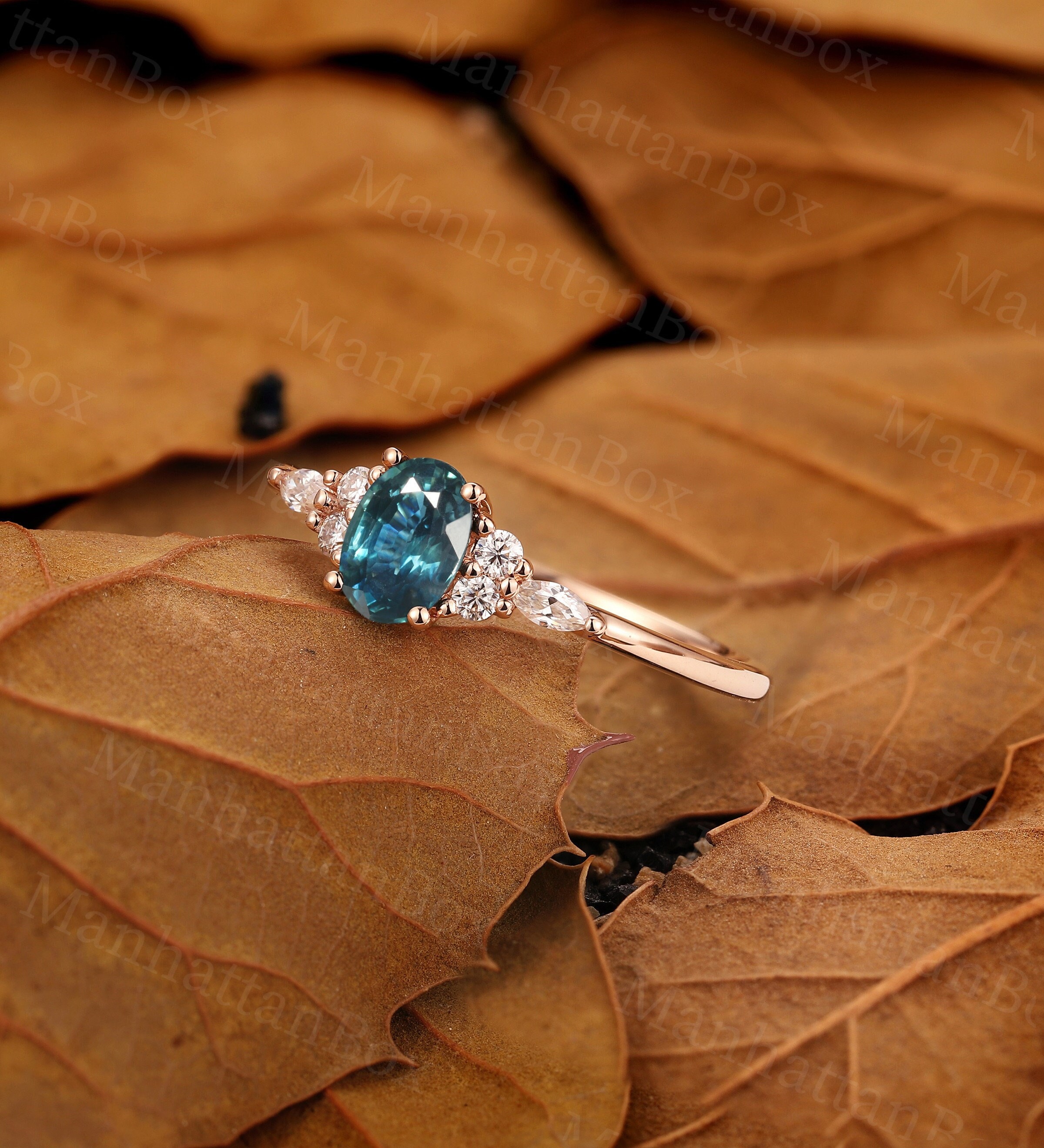 Peacock sapphire sales engagement ring