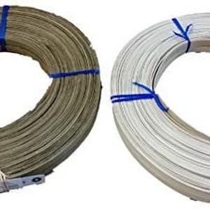 May include: Two spools of natural fiber weaving material. One spool is natural brown and the other is white. Both spools are wrapped with blue string.