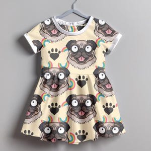 Pug-tastic T-shirt dress, made to order ages 0-5years. Customisable collar and cuffs, choice of sleeve length and dress style.