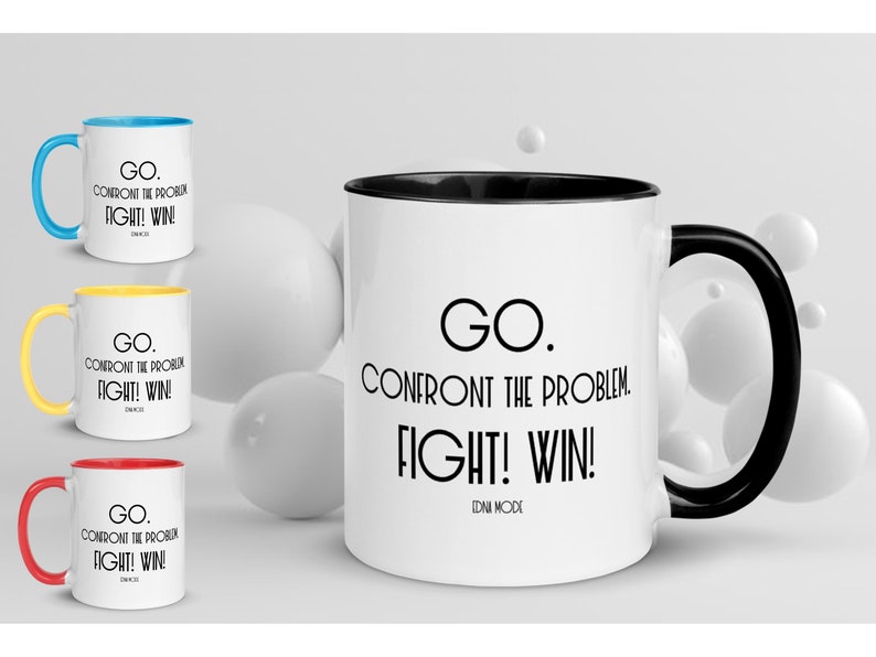 May include: White ceramic coffee mug with a black rim and handle. The mug has black text that reads "GO. CONFRONT THE PROBLEM. FIGHT! WIN! IDNI MODE".