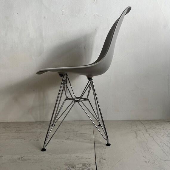 Grey armchair with chrome legs discount