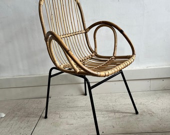 Bamboo chair with black metal frame legs