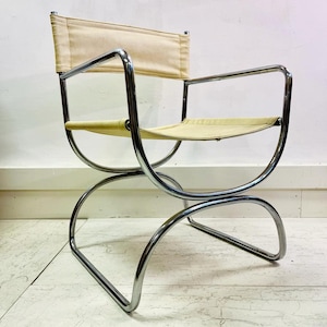 A Pair of Mid century Cream leather and chrome Chairs Dining Chairs