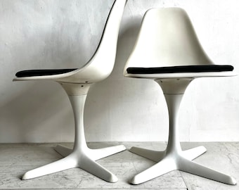 A pair of Arkana Chairs By Maurice Burke chairs
