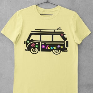 May include: A yellow t-shirt with a black and white illustration of a vintage van with the word "love" and colorful flowers on the side.