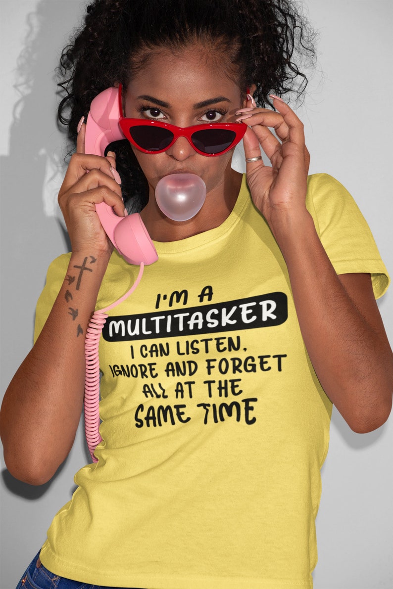 May include: A yellow t-shirt with black text that reads "I'm a Multitasker. I can listen, ignore and forget all at the same time."