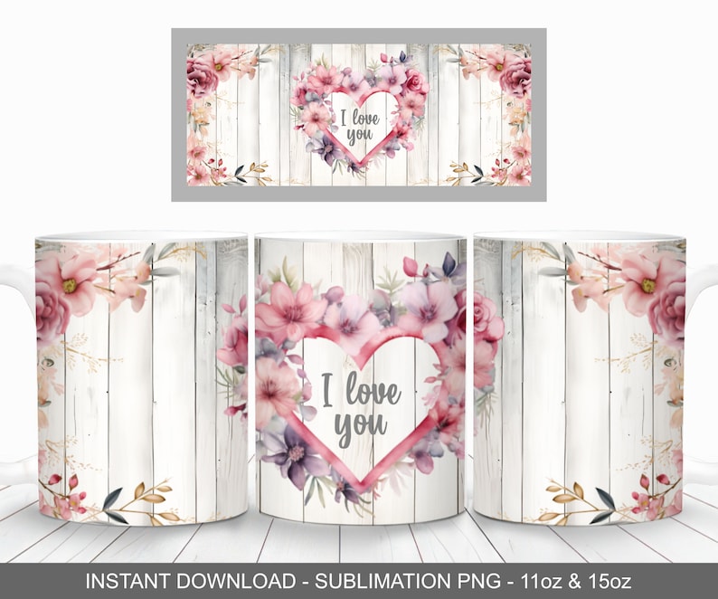 May include: White ceramic mug with a sublimation design featuring a pink and purple floral wreath with a heart in the center. The heart is outlined in red and has the text "I love you" inside. The background is a whitewashed wood plank design.