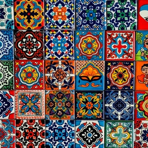 May include: A collection of thirty square ceramic tiles arranged in a grid, featuring a variety of colorful geometric, floral, and figurative patterns including skulls, a female figure, and a mermaid, all rendered in vibrant shades of blue, red, and yellow.