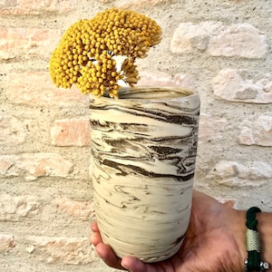 White and brown ceramic vase made in France