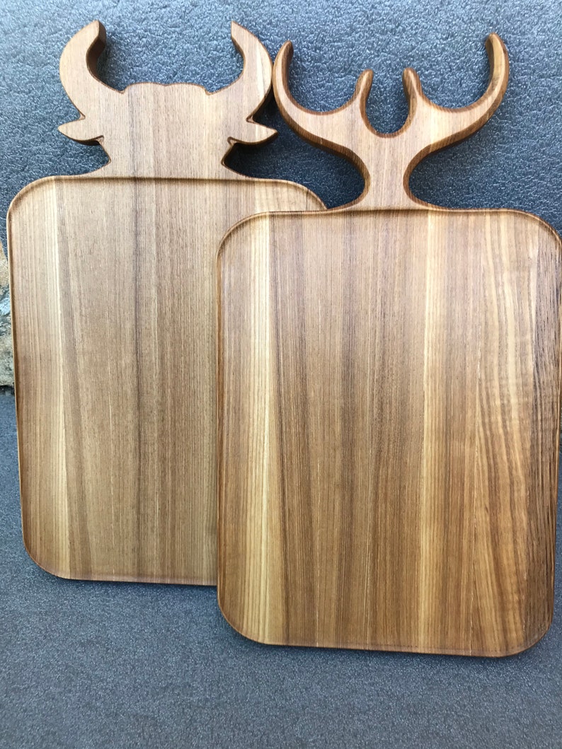 Oak cutting board with a deer bull antler handle. Handmade. Etsy