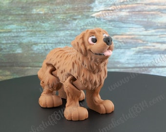 May include: A brown, furry, articulated dog toy. The dog has a pink tongue sticking out and black eyes.