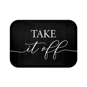 May include: Black doormat with white text that reads "TAKE it off".