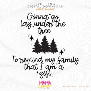 May include: Black and white text graphic design with the text "Gonna go lay under the tree to remind my family that I am a gift." with three stylized trees and stars. The text "Mama Lemon SVG" is at the bottom of the design.