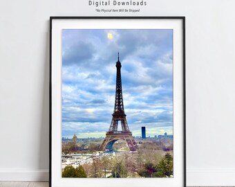 May include: Framed print of the Eiffel Tower in Paris, France, set against a cloudy sky. The image includes the text "LIFESTYLE DESIGN DIGITAL DOWNLOADS *No Physical Item Will Be Shipped."