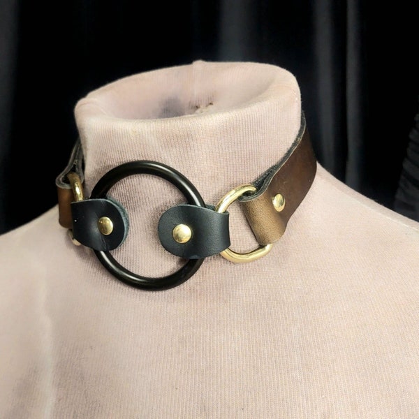 Olive leather collar with black steel and gold hardware. Adjustable buckle closure. Made as ordered. Handmade. All genders.