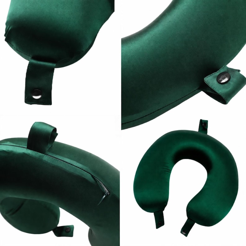 May include: A dark green travel pillow with a U-shape design. The pillow has a satin-like texture and features a snap closure and a zipper. The pillow has two fabric straps with snaps and a zipper closure.