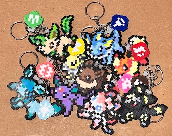 Handcrafted Perler Bead Keychains Inspired by Colorful Fox Evolutions -- Shiny and Classic Color Variations Available