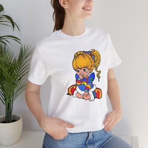 Camiseta nostálgica arcoíris brillante, unisex, retro de los 80, con personaje de dibujos animados, vintage de los 90, estampado gráfico colorido, con aires arcoíris, regalo