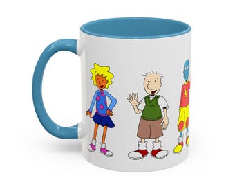 May include: White ceramic mug with a blue rim. The mug features a cartoon illustration of four characters from the animated television series 'The Wild Thornberrys'. The characters are standing in a row and are facing forward. The characters are wearing colorful clothing. The mug is a great gift for fans of the show.