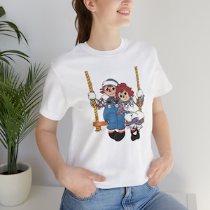 Raggedy Ann and Andy Doll Swing Unisex Jersey Short Sleeve Tee