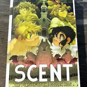 May include: A paperback book titled "SCENT The Pursuit of the Golden Hill Vol. 4" features a colorful illustration. The cover art depicts several anime-style characters, wolves, and a church. The book has a white border and is set against a light background.