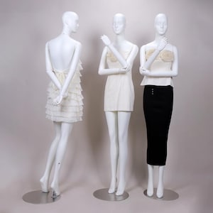 White Fiberglass Female Mannequin: Elegant Dress Form with Silver Base