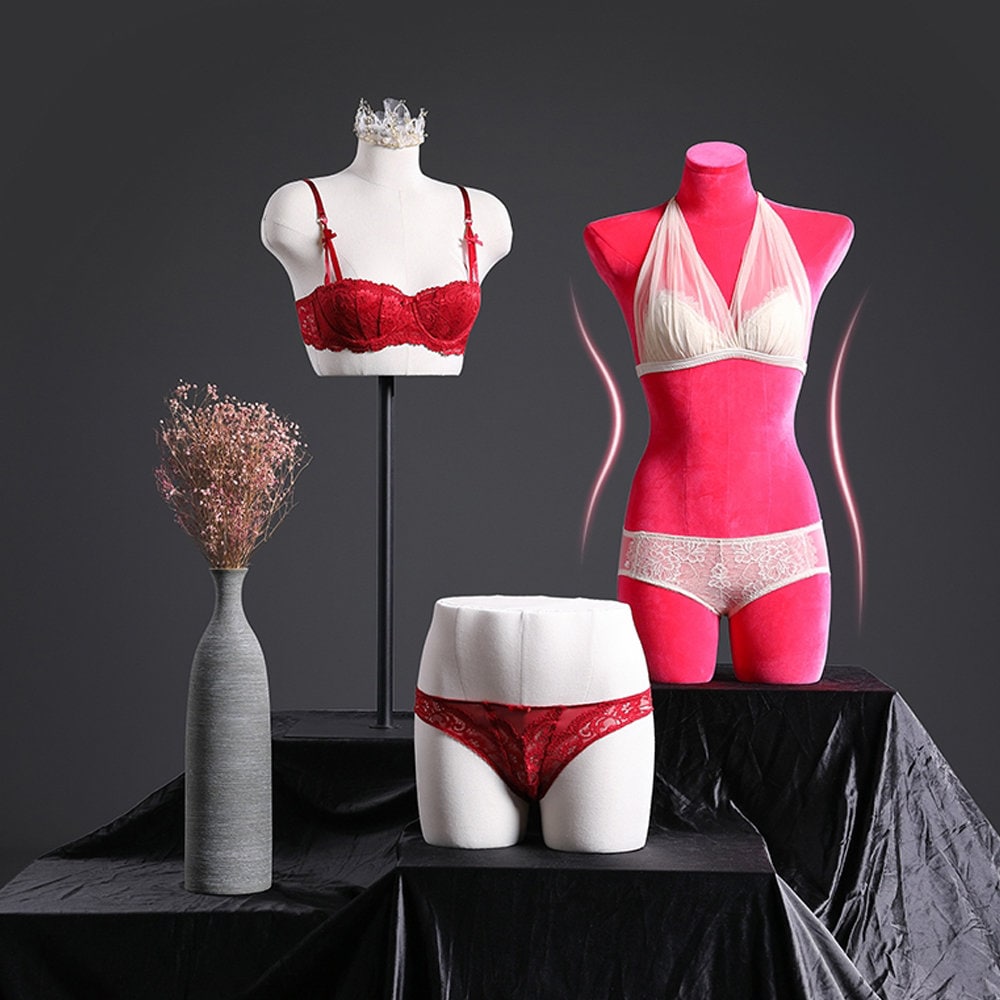 Orange female mannequins in underwear. Lingerie store, lace bra and panties  in a shop. 14185594 Stock Photo at Vecteezy