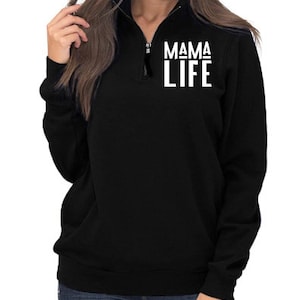 May include: Black mock neck sweatshirt with a white zipper and the text "MAMA LIFE" printed on the front.