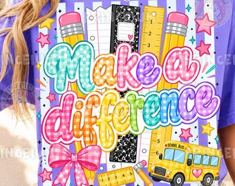 May include: A purple t-shirt featuring a graphic print of school supplies including two yellow pencils, a ruler, a black composition notebook, and a yellow school bus. The text "Make a difference" is printed in large, colorful, checkered letters.