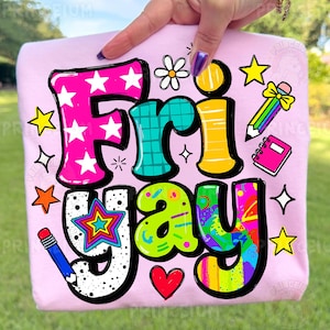 May include: A light pink sweatshirt with the word "Friday" in a colorful, playful design. The letters are outlined in black and filled with various patterns and colors, including stars, a flower, and a heart.