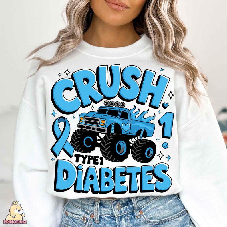 May include: White sweatshirt with a blue monster truck graphic and the text "Crush Type 1 Diabetes".