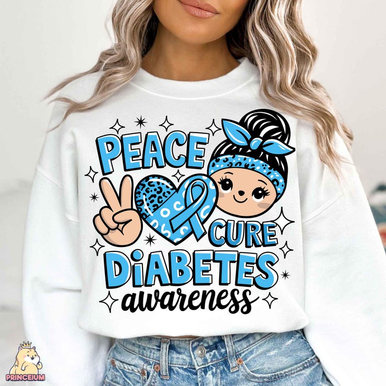 May include: White sweatshirt with a blue ribbon, peace sign, and heart with the text "Peace Cure Diabetes awareness".