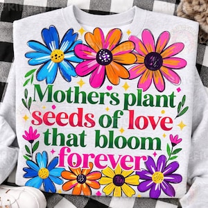 May include: A set of three ceramic mugs with a speckled, matte finish. The mugs are in shades of cream, light gray, and dark gray. Each mug has a simple, minimalist design, perfect for coffee or tea.