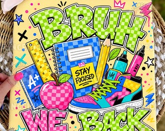 May include: A yellow square sign featuring the text BRUH WE BACK in green and pink checkered letters. The design includes a blue notebook with a STAY FOCUSED sticky note, a yellow ruler, a pencil, a pink apple, and a colorful high-top sneaker.