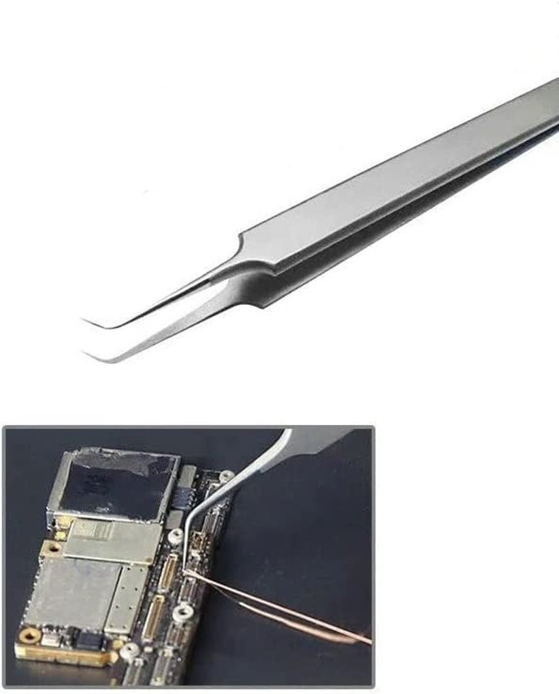 May include: A pair of silver-coloured tweezers with a bent tip. The tweezers are being used to manipulate a small electronic component on a circuit board.