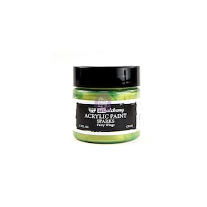 May include: A jar of Art Alchemy acrylic paint in the color "Sparks Fairy Wings." The paint is a shimmering green color with a black lid. The label reads "1.7 fl oz (50 ml)."