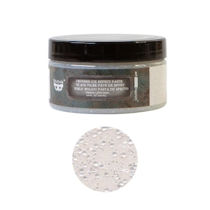 May include: A jar of crushed ice effect paste with a black lid. The label reads "CRUSHED ICE EFFECT PASTE" in English, French, and Spanish. The jar contains iridescent glitter paste, 3.4 fl oz (100 ml). A close-up shows the paste's texture.
