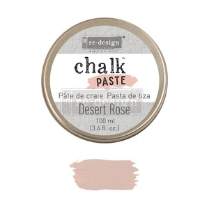 May include: A round tin of re-design chalk paste in the color Desert Rose. The tin is labeled with the brand name, product name, and color. The tin contains 100 ml (3.4 fl. oz.) of chalk paste.