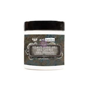 May include: A white jar with a black lid containing transparent heavy body gel. The label reads "art basics Heavy Body Gel Gel Lourd Gel Pesado Transparent Transparente 8.5 fl oz (250 ml)"