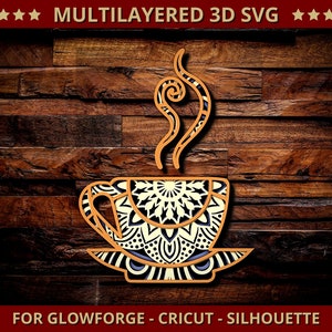 May include: A layered 3D SVG design of a coffee cup with steam, featuring a detailed mandala pattern. The design is in shades of orange, black, and white, set against a dark wood background. Text at the top reads "MULTILAYERED 3D SVG" and at the bottom "FOR GLOWFORGE - CRICUT - SILHOUETTE".