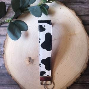 Llavero de vaca, llavero con estampado de vaca, llavero con estampado de vaca, llavero de pulsera estilo occidental, llavero de pulsera, llavero de pulsera de ganado, llavero