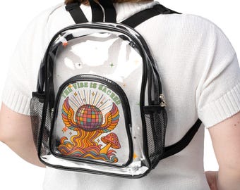 Mochila transparente aprobada para estadios, conciertos, festivales y días de partido. Correas negras de PVC.