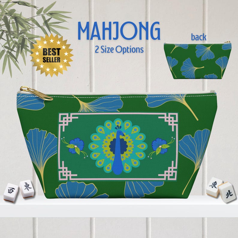 May include: Green Mahjong-themed pouch with a peacock design. The pouch features a zipper closure and a repeating pattern of blue leaves. The text "MAHJONG" and "2 Size Options" are displayed on the front. A smaller pouch with a leaf pattern is shown.