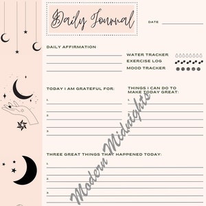 May include: A pink and white daily journal with a moon and stars design. The journal has sections for daily affirmations, gratitude, things to make the day great, three great things that happened today, and thoughts and reflections. The journal also includes trackers for water, exercise, and mood.